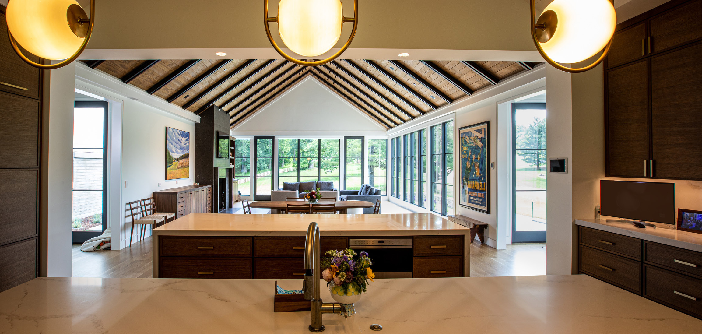 Modern Maryland Marvel: the kitchen and open living space in Crestron’s official project PDF.