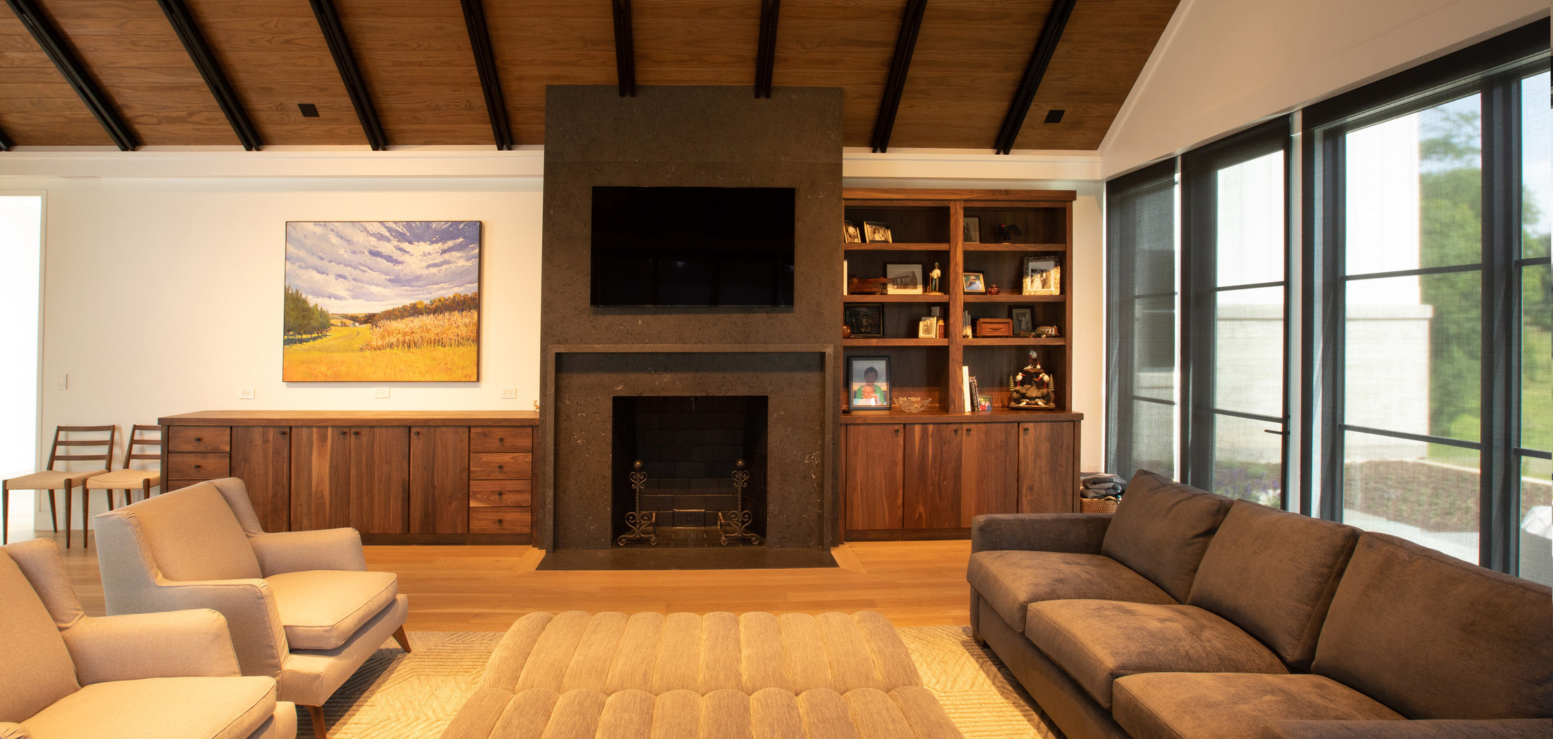 The Maryland living room and media wall in official Crestron project photography.
