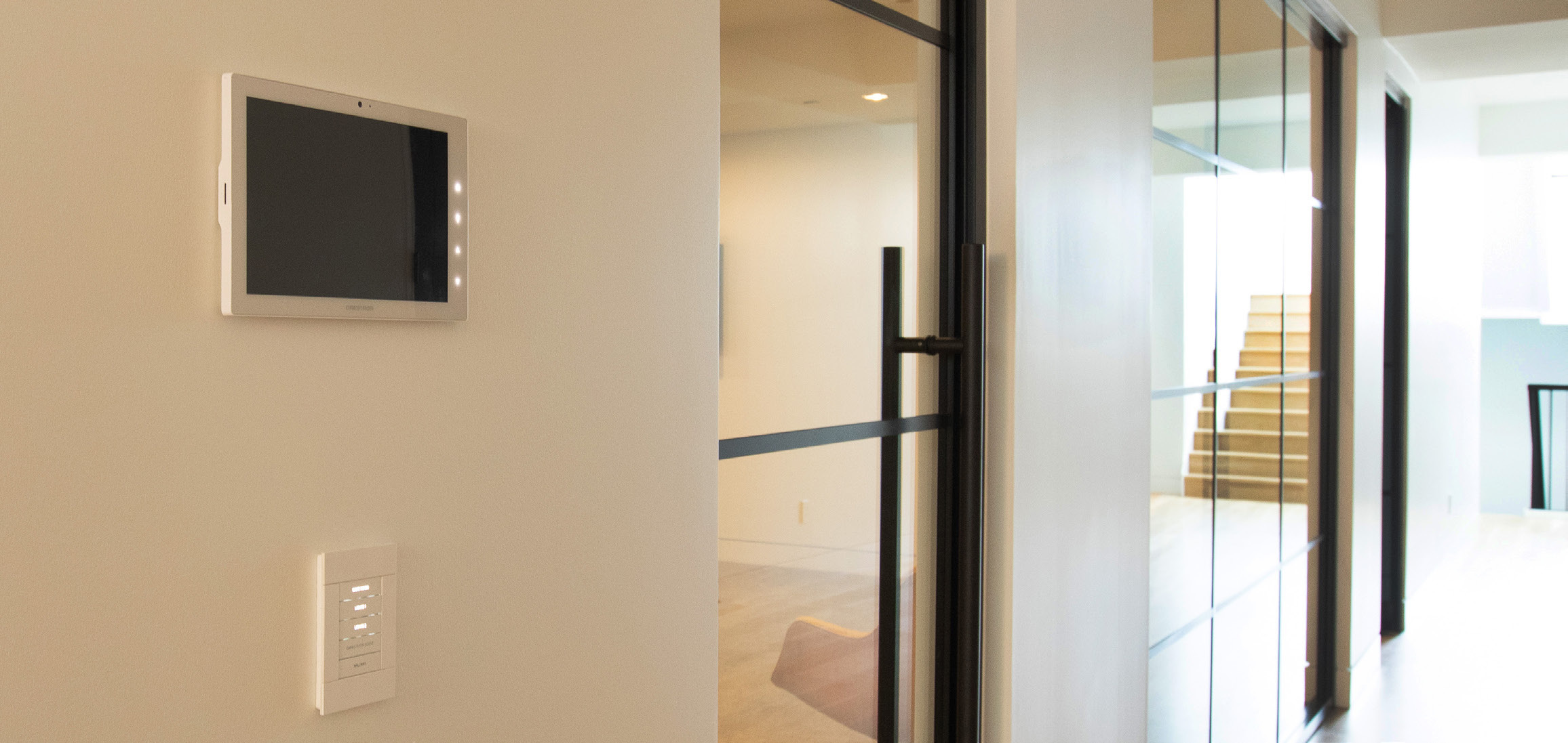 A wall-mounted screen and physical controls in the official Maryland case study.