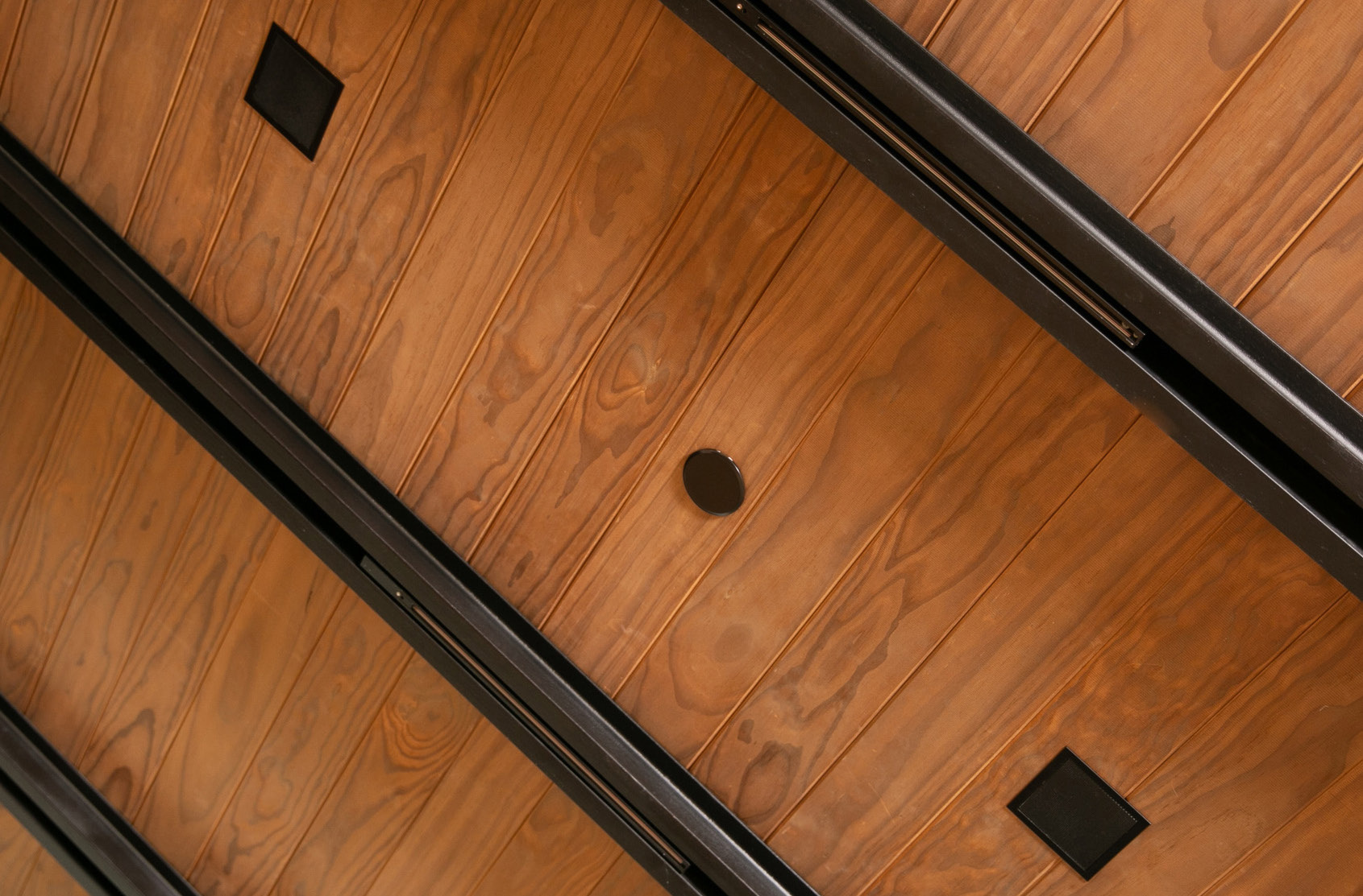 Speakers within the timber ceiling in the official Maryland project imagery.