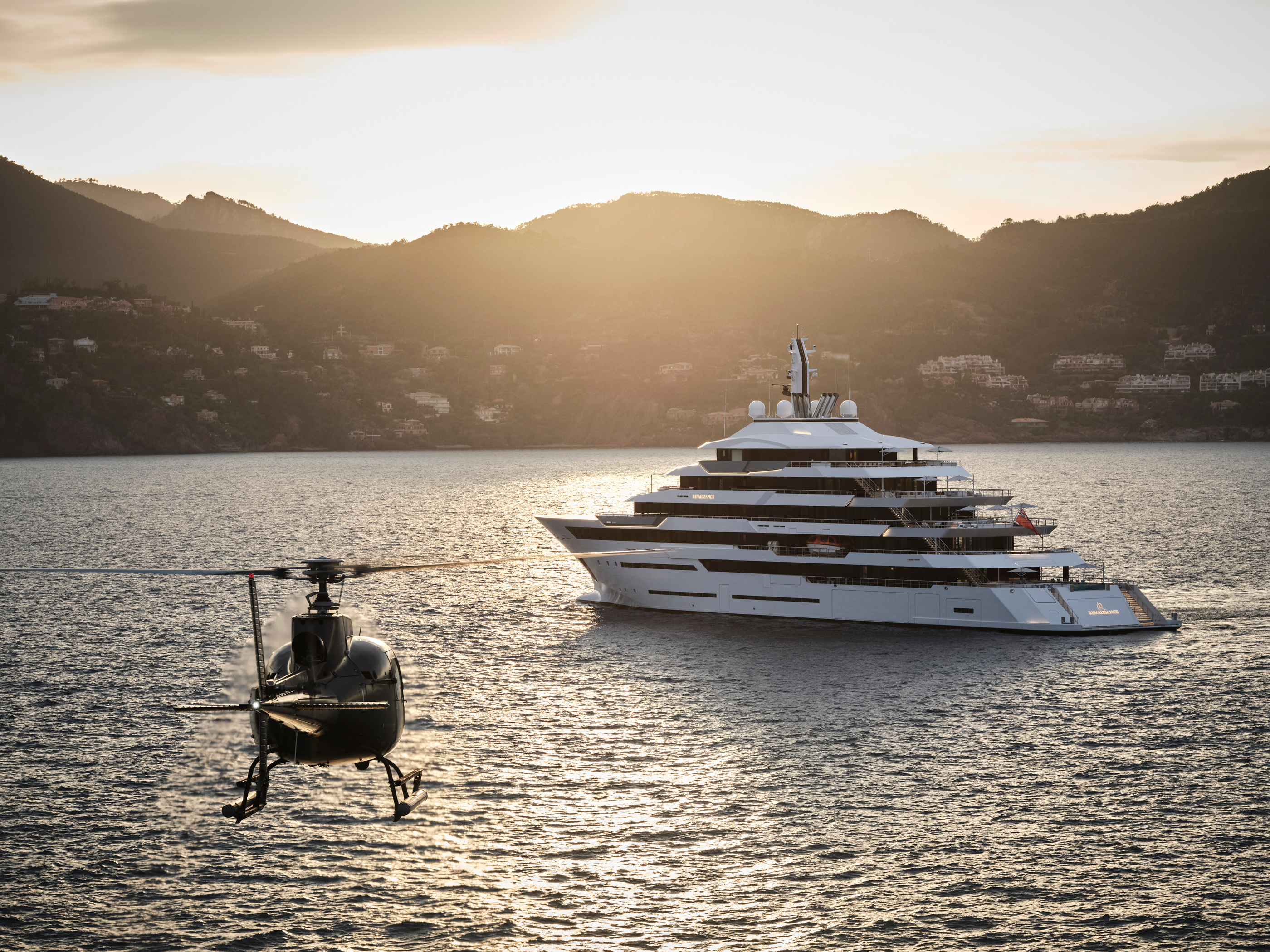 A yacht at anchor in Burgess’s published owner-services imagery.