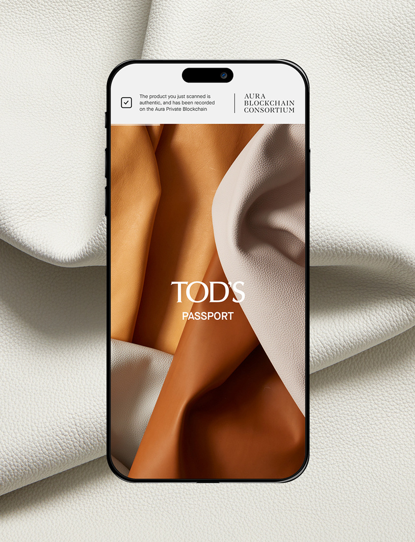 Tod’s Passport interface on a smartphone in Aura’s official case-study imagery.