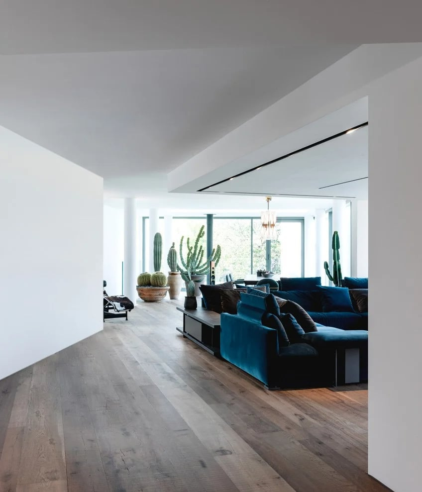 The furnished living space and glazing in Poliform’s Villa Aghe record.