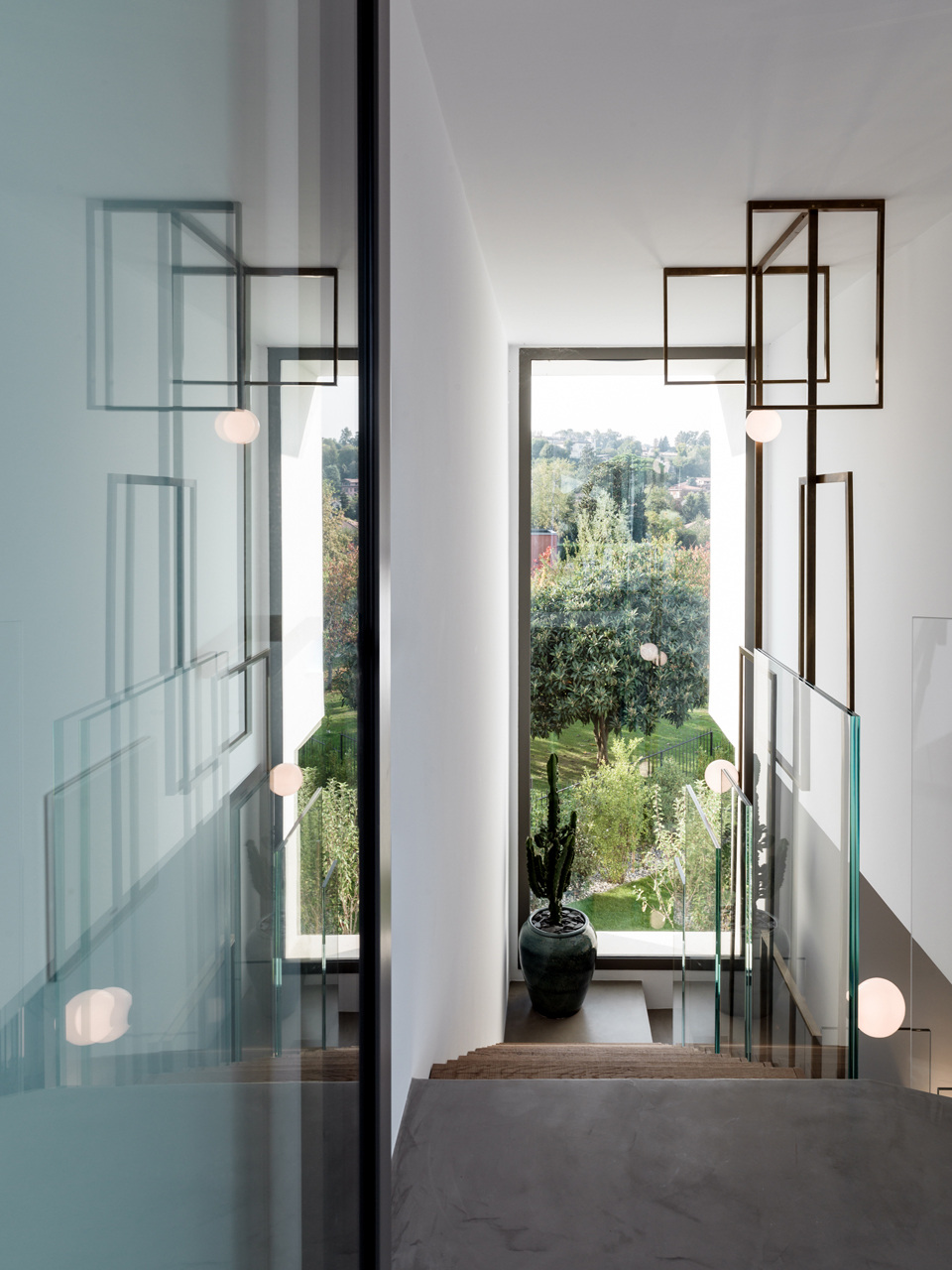 A nearer reading of the stair volume and suspended light.