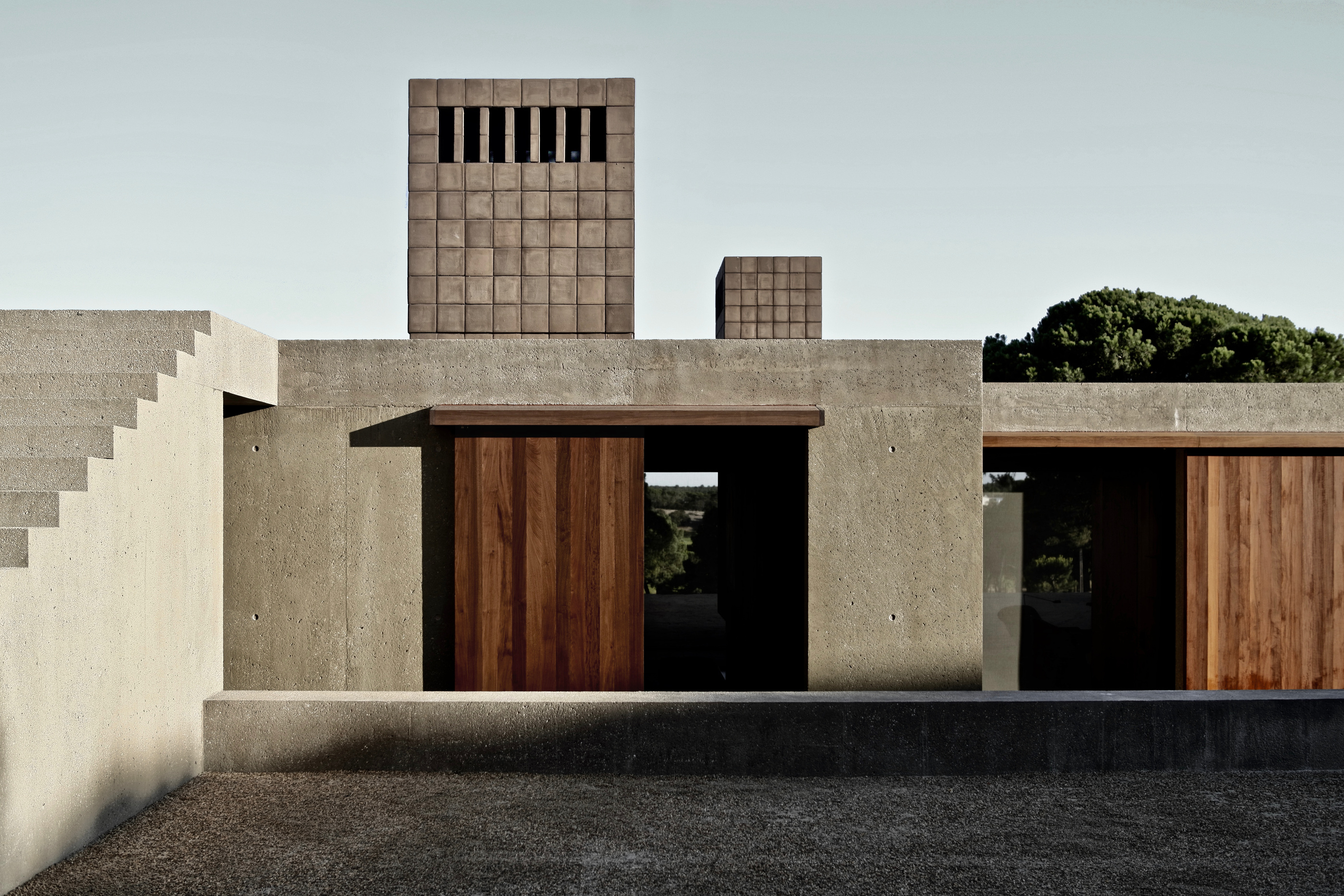 Casa M’s concrete volumes in the studio’s official project photography.