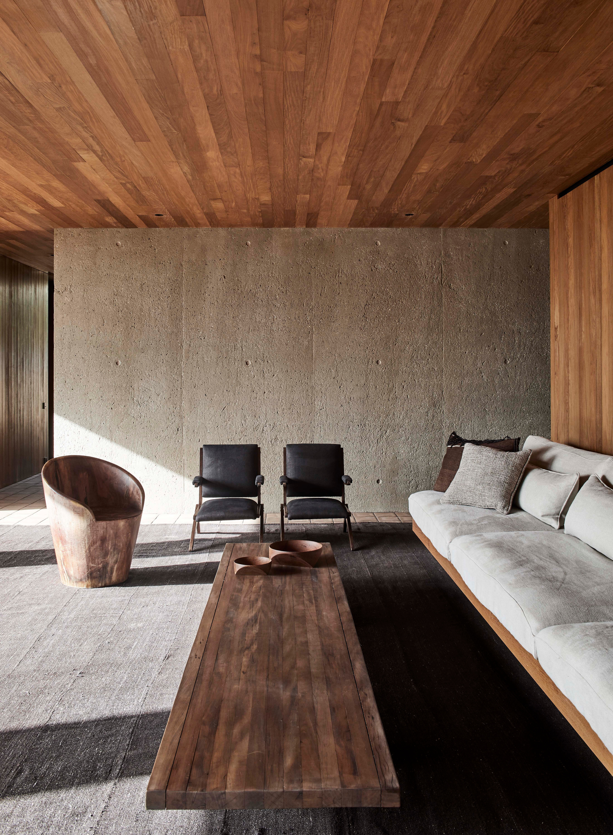 A furnished interior changes the scale of the material palette.