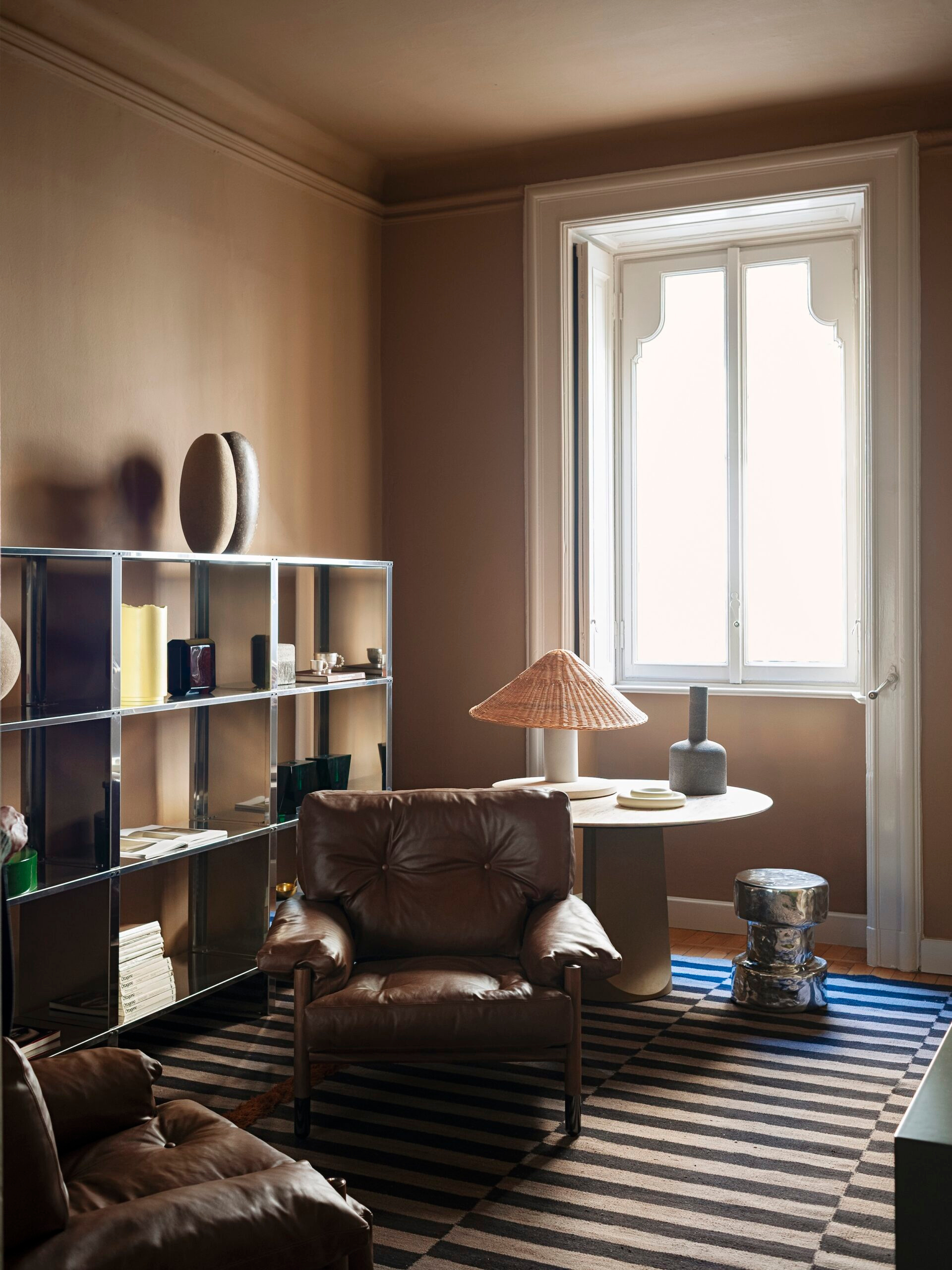 A reading place beside the window in Andrea Ferrari’s project photographs.