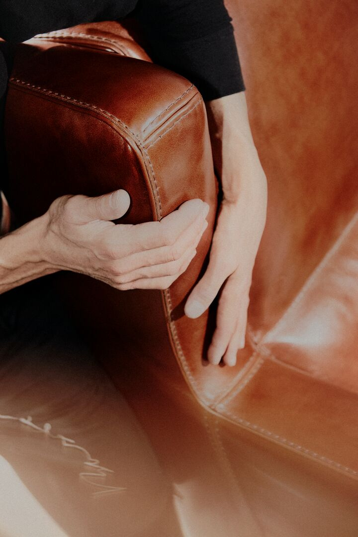 Leather handled around a form during production.