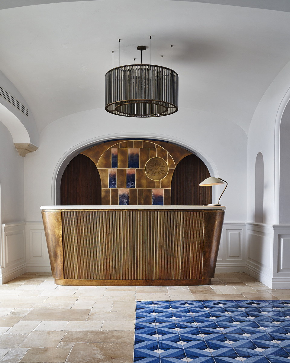 Reception and suspended lighting in Venicem’s Borgo Santandrea photographs.