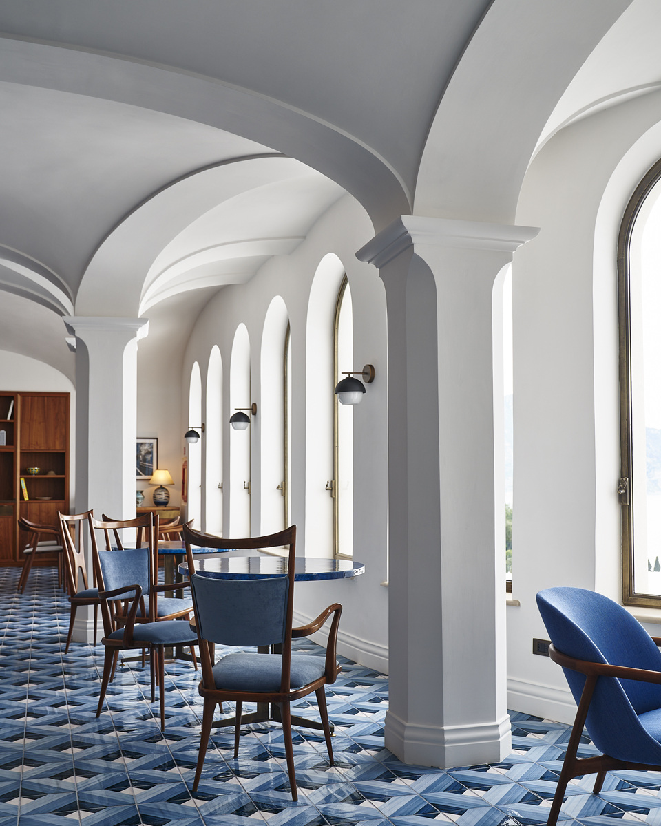 Arches, furnishings and local light in a documented hotel interior.