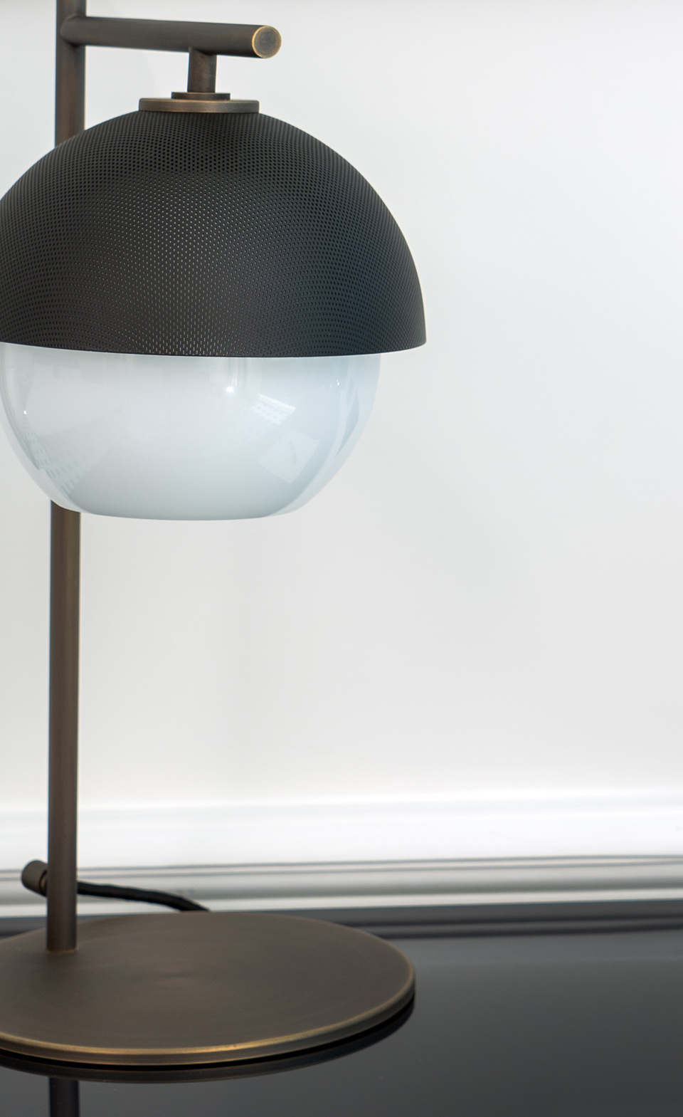 A closer view of a table lamp within the same hotel project.