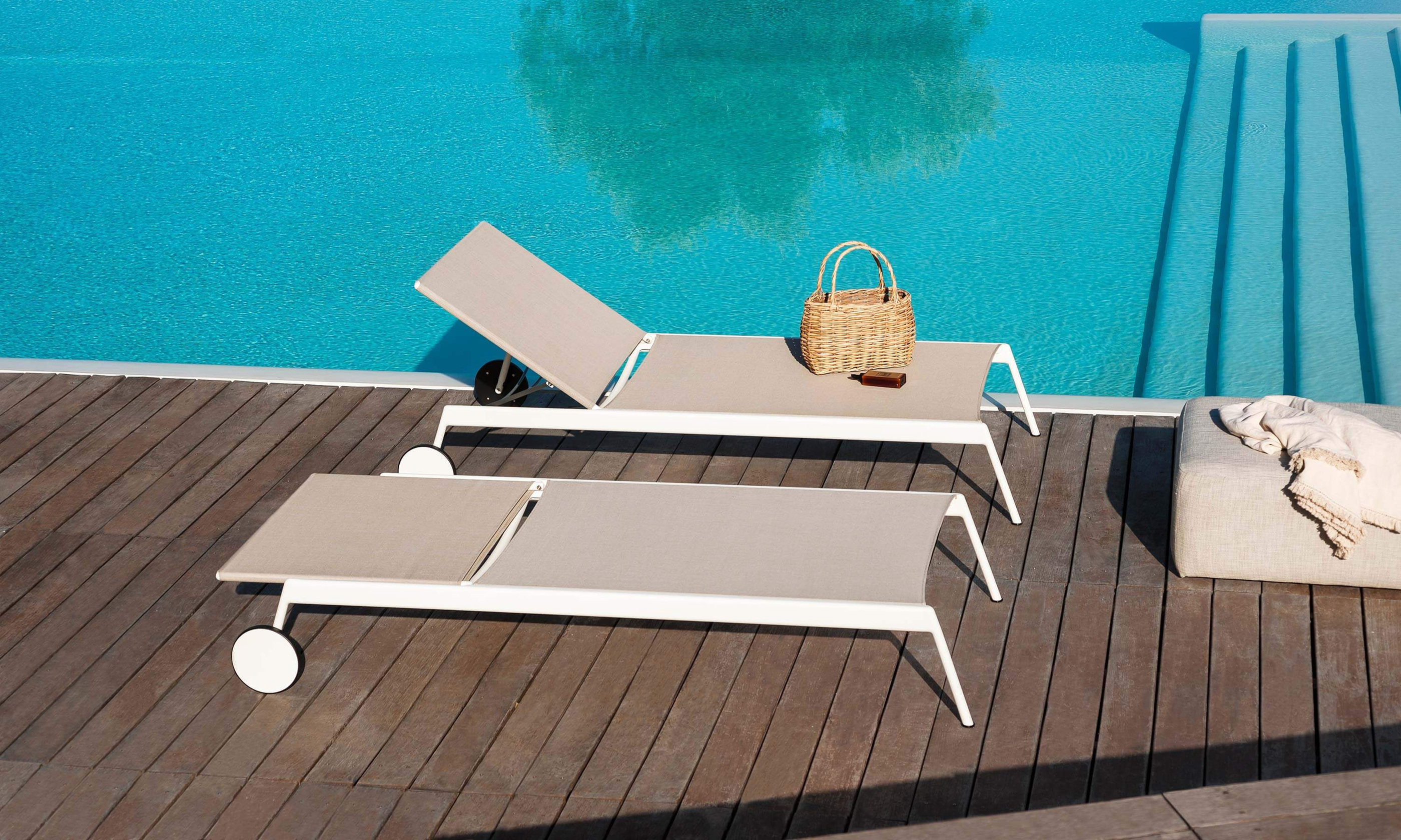 RODA Piper sunloungers beside a pool; an official setting, not proof of a marine test.