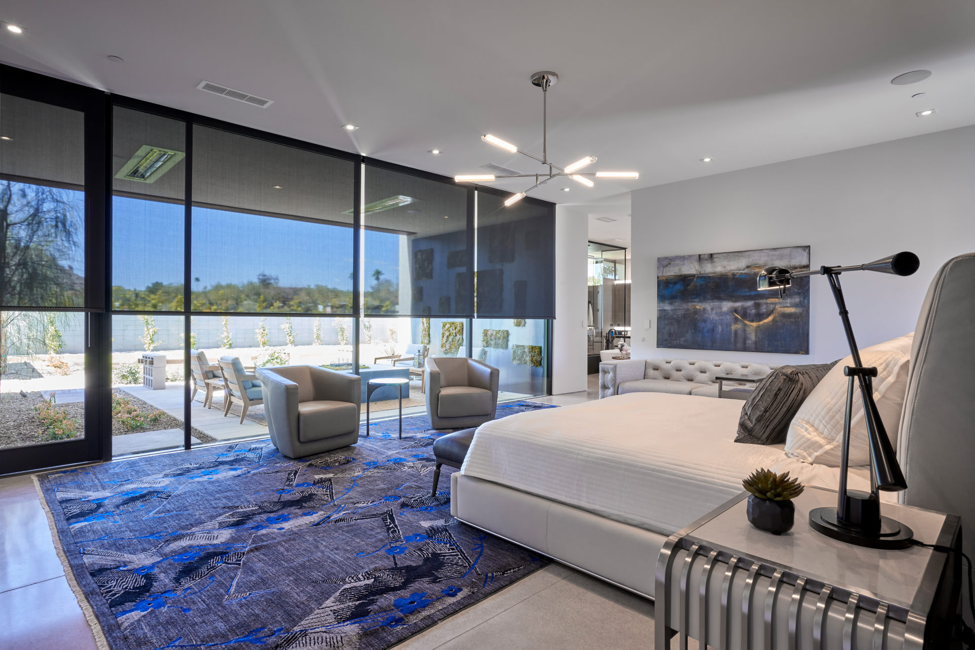 A bedroom image from Crestron’s official shading presentation.