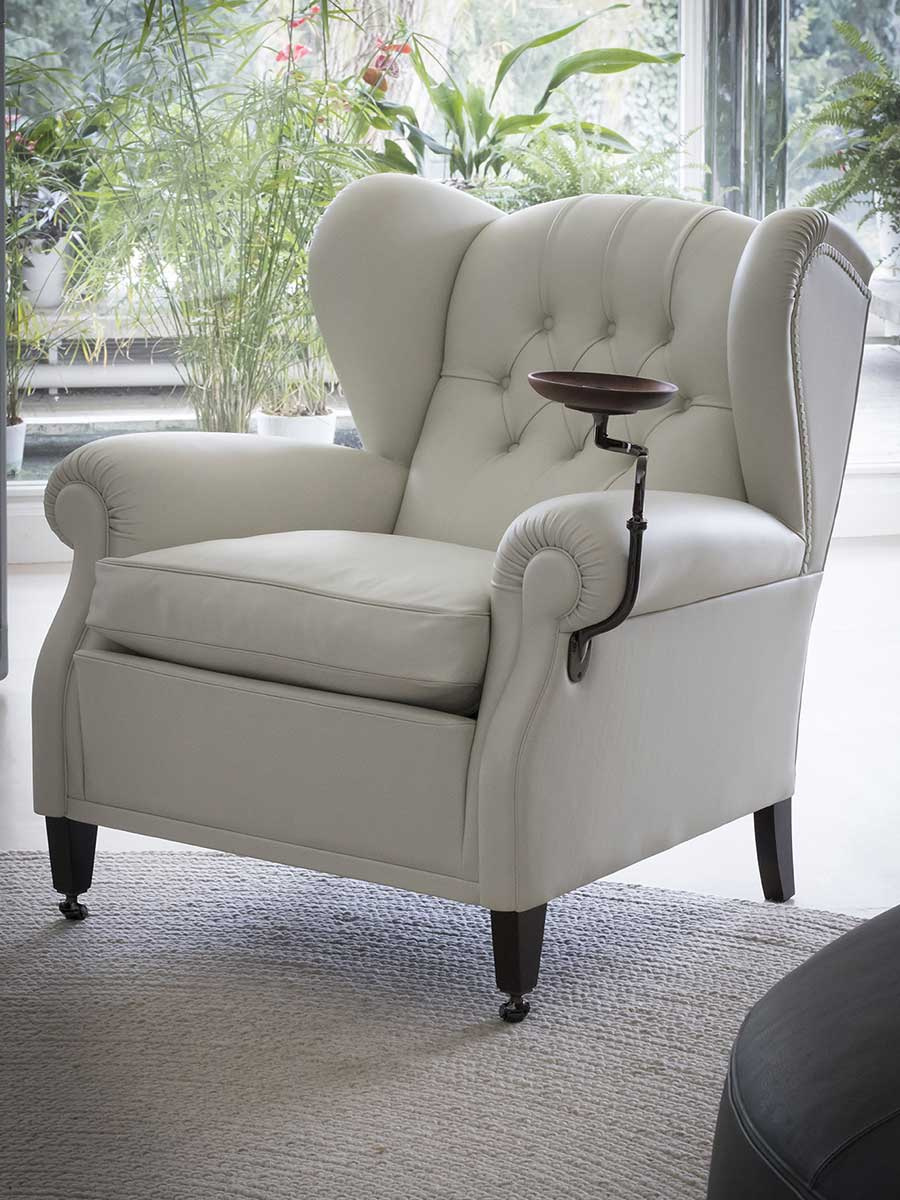 A light-upholstered 1919 in an official room setting.