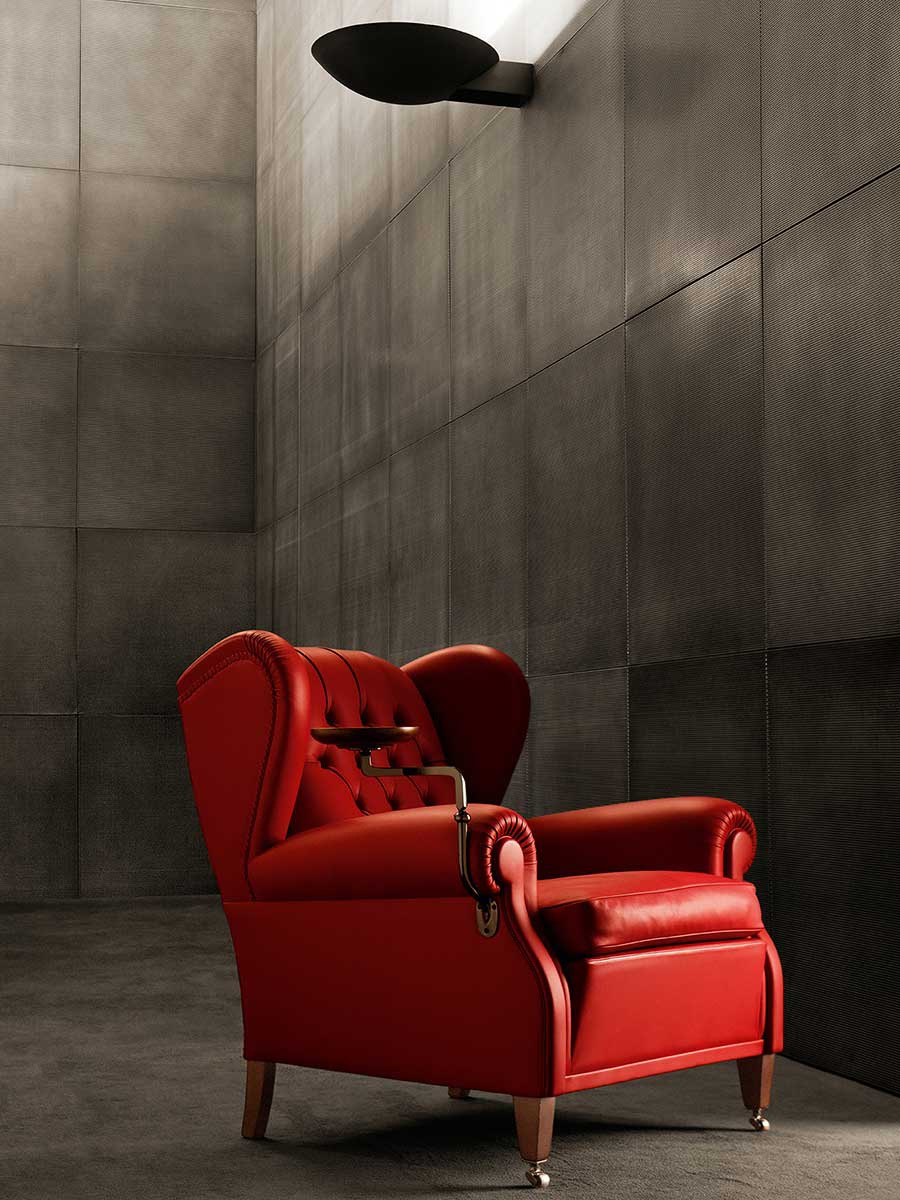 A red 1919 armchair in another official setting.