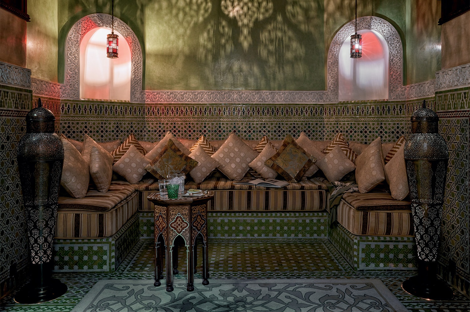 Seating and patterned surfaces in the Premier riad photographic sequence.