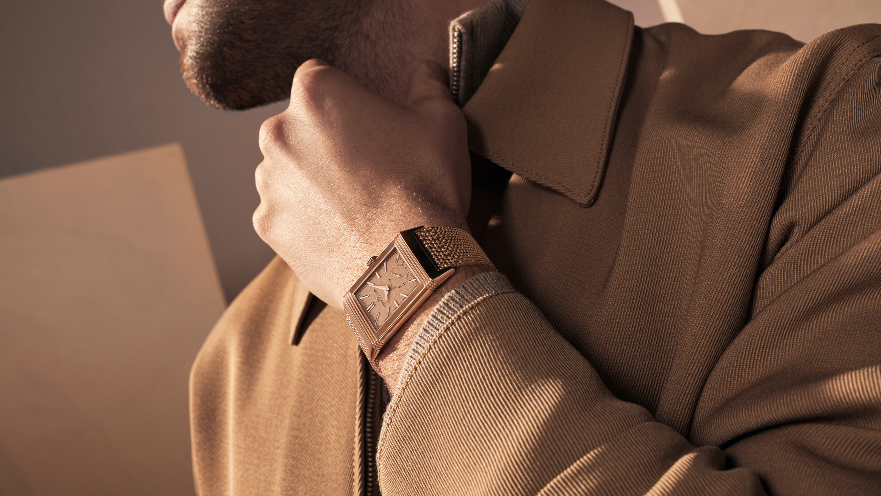 The pink-gold Reverso and Milanese bracelet in the manufacturer’s official wearing photograph.
