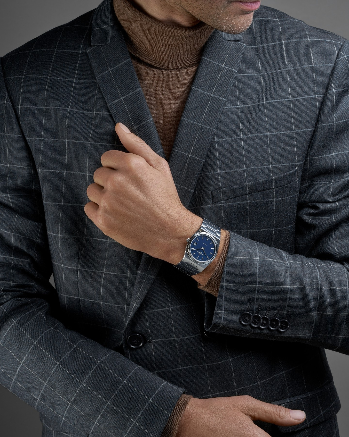The steel, blue-dial Historiques 222 in Vacheron Constantin’s official wearing imagery.