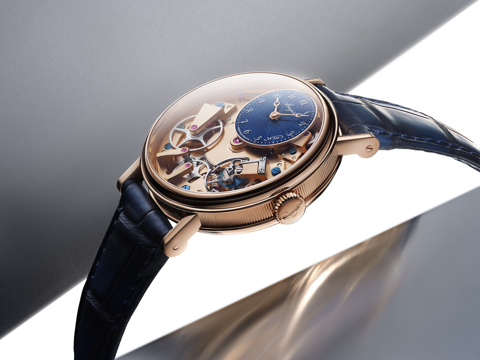 A profile view of the 2025 Tradition 7035, showing the smaller dial above the visible mechanism.