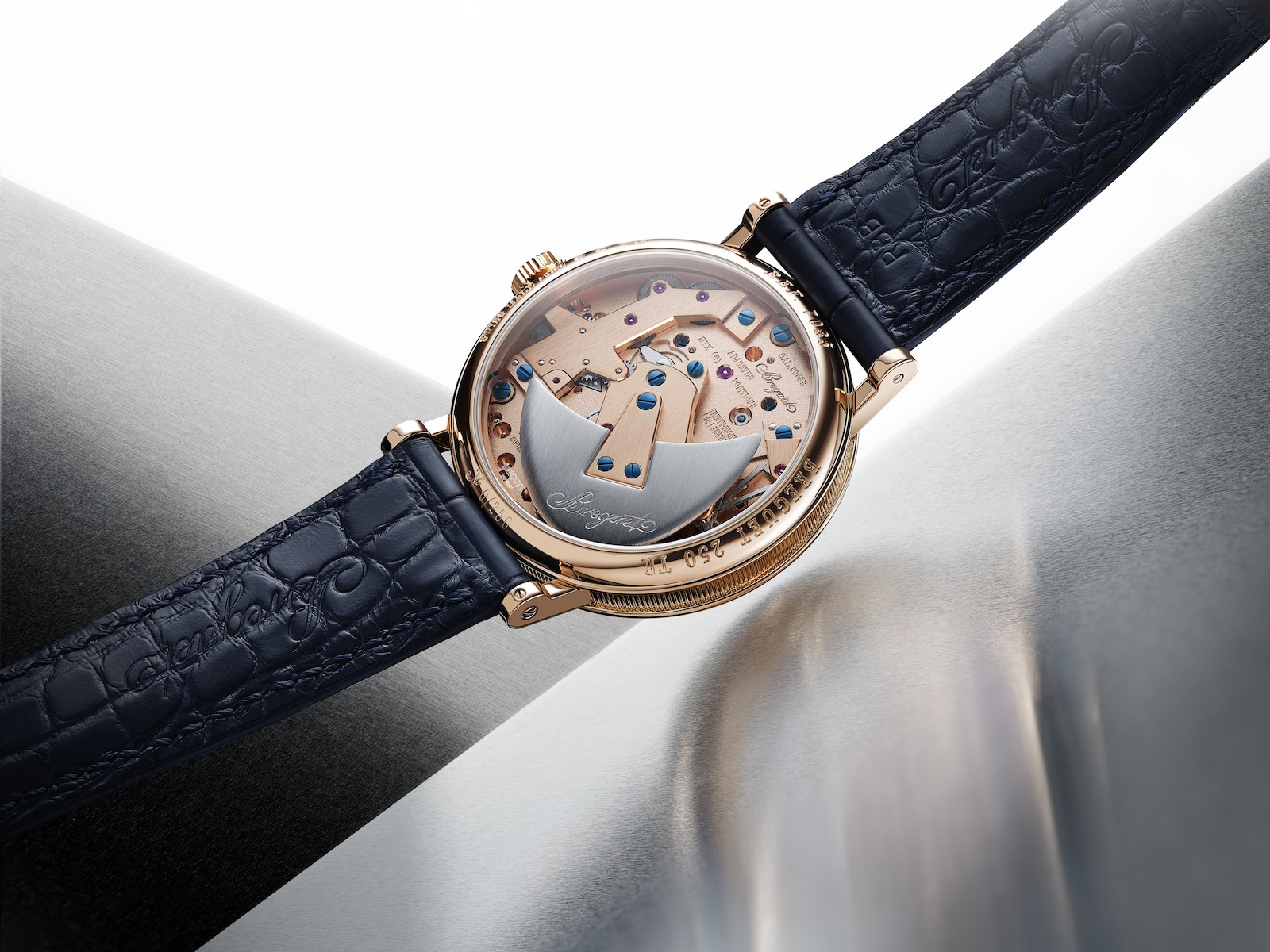 The reverse and crescent-shaped winding weight in Breguet’s official photographic sequence.