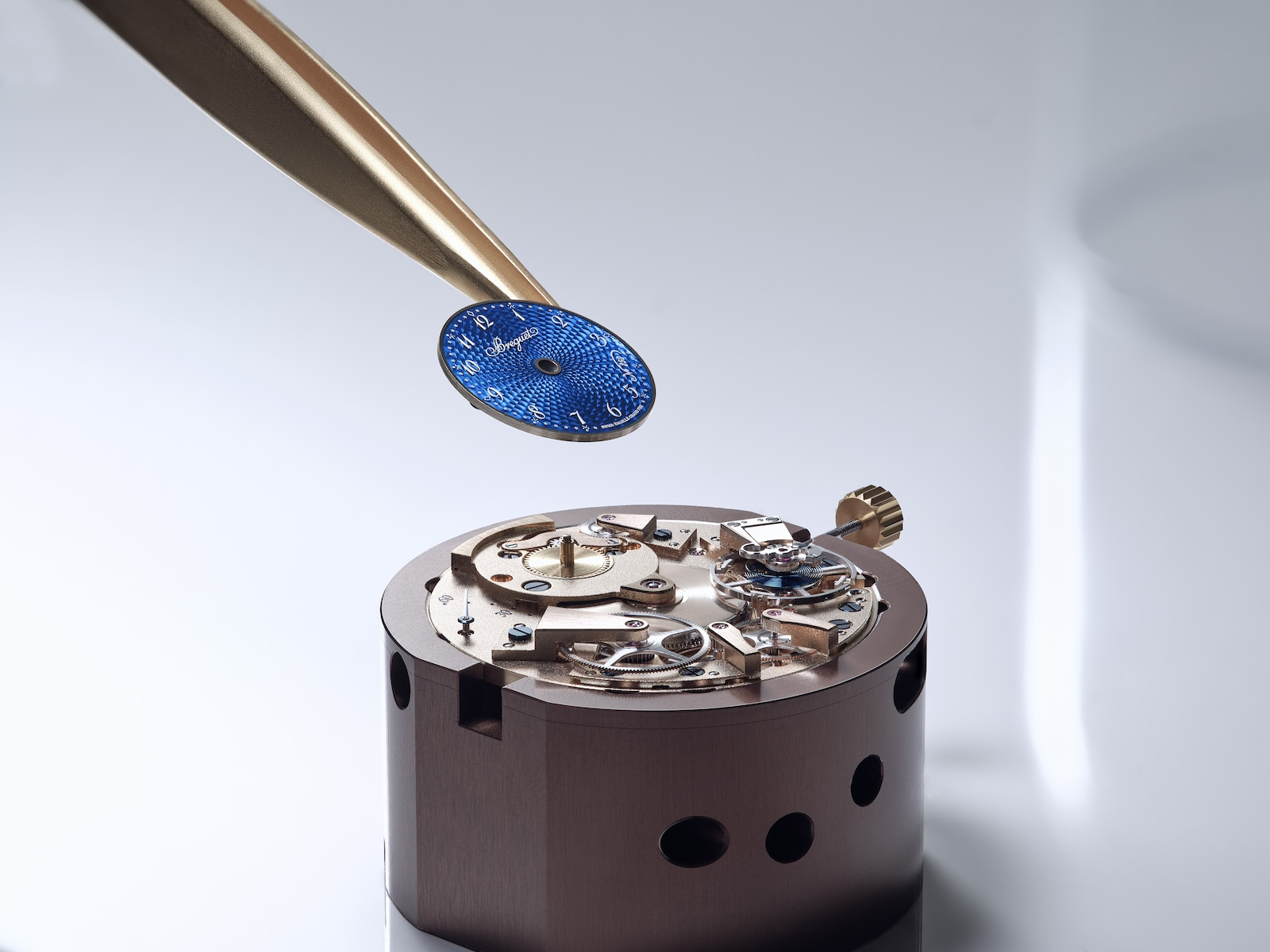 The small blue dial above the movement in Breguet’s official assembly imagery.