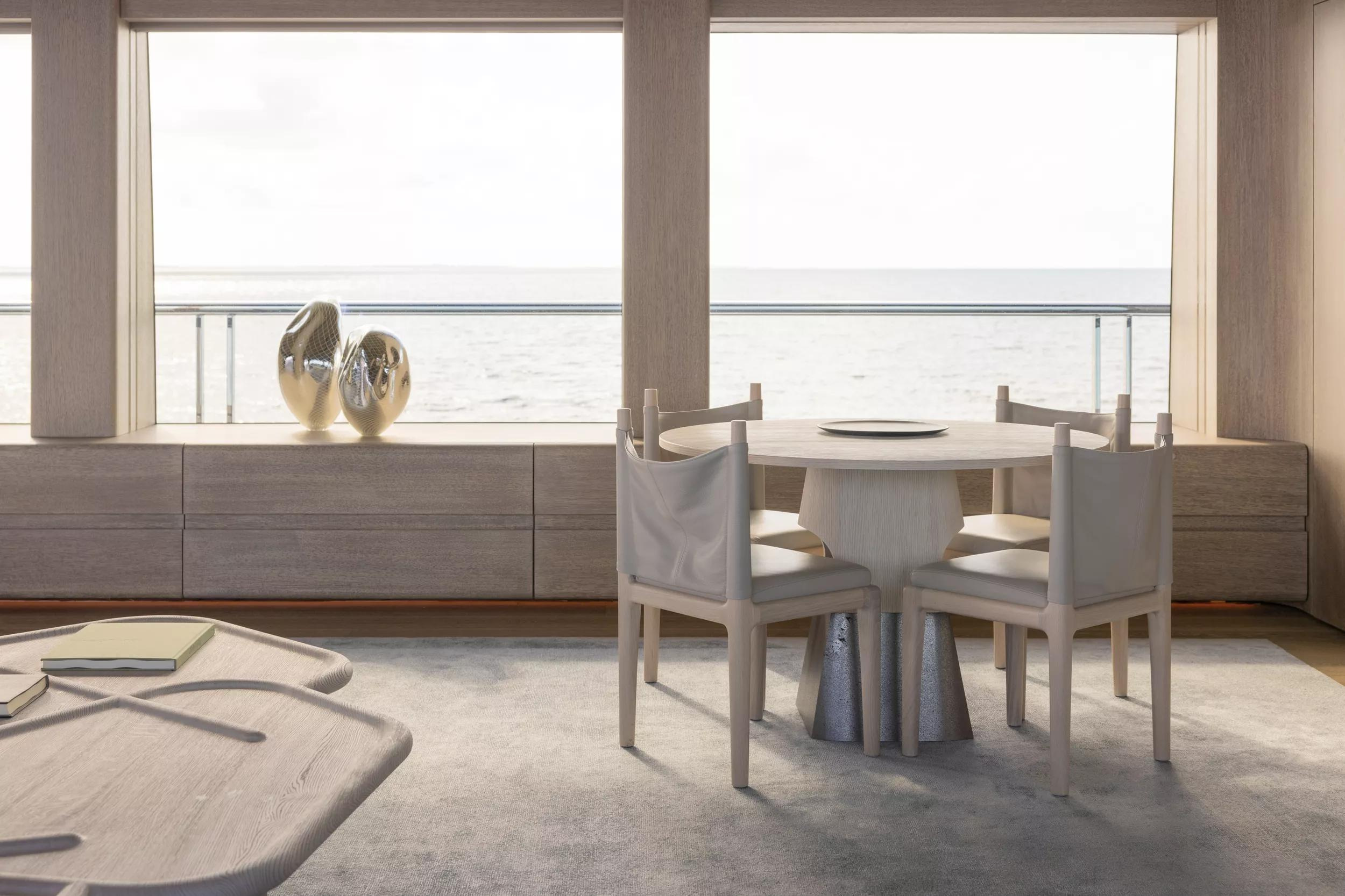 A table beside the windows in the official ENTOURAGE interior sequence.