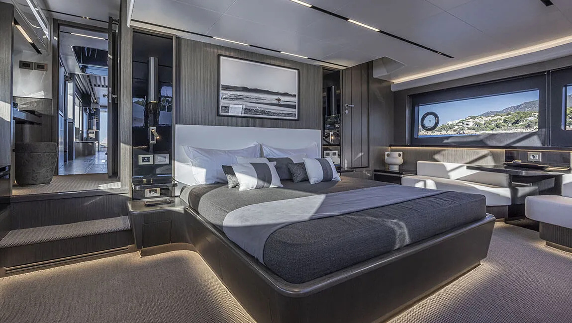 The owner’s bedroom illustrated in the Pearl 82 Indulgence interior sequence.