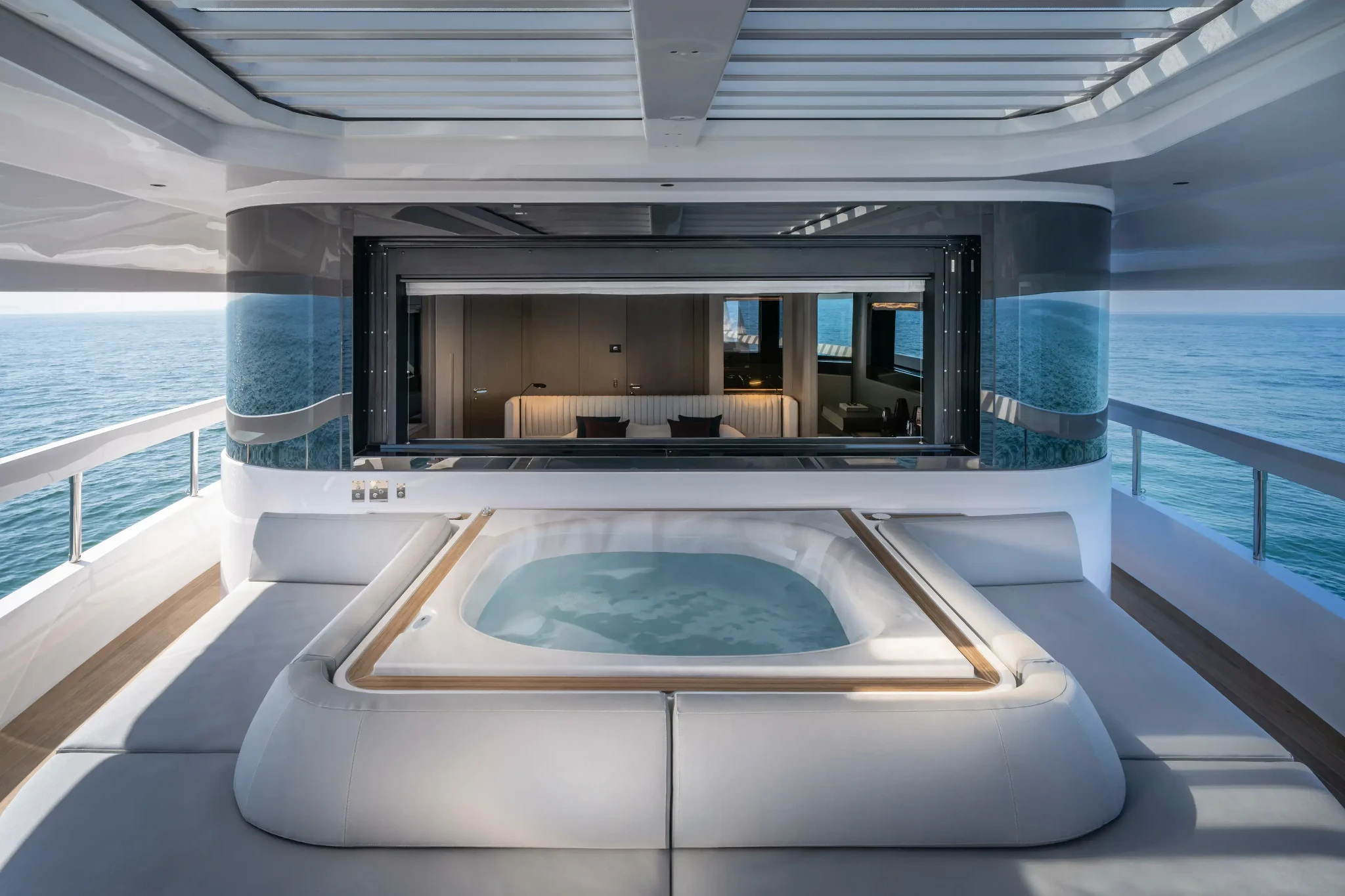 The sheltered forward terrace shown in Ferretti Yachts’ official INFYNITO 90 gallery.