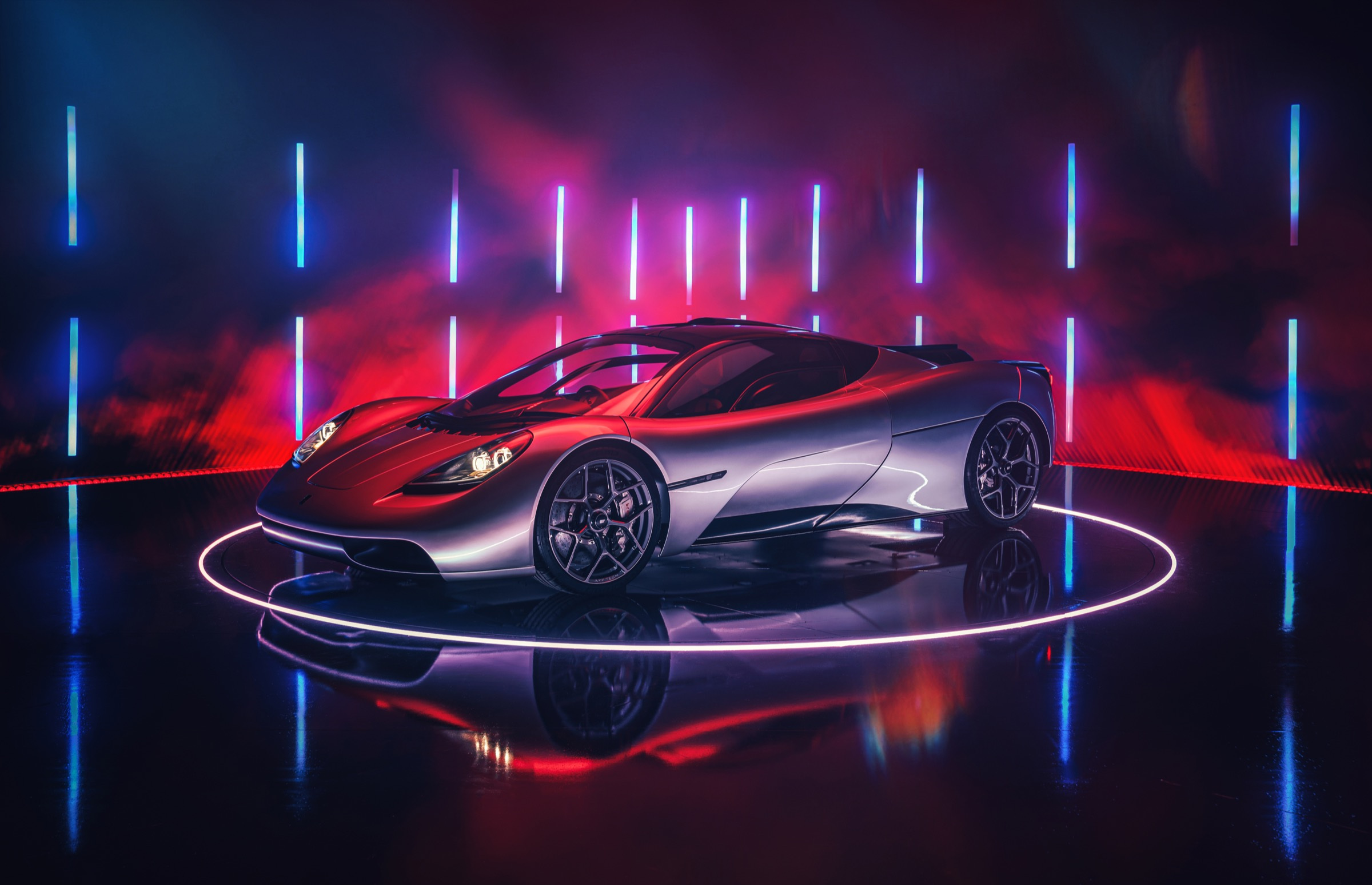 The T.50 in the current official studio sequence, with coloured reflections across its body.