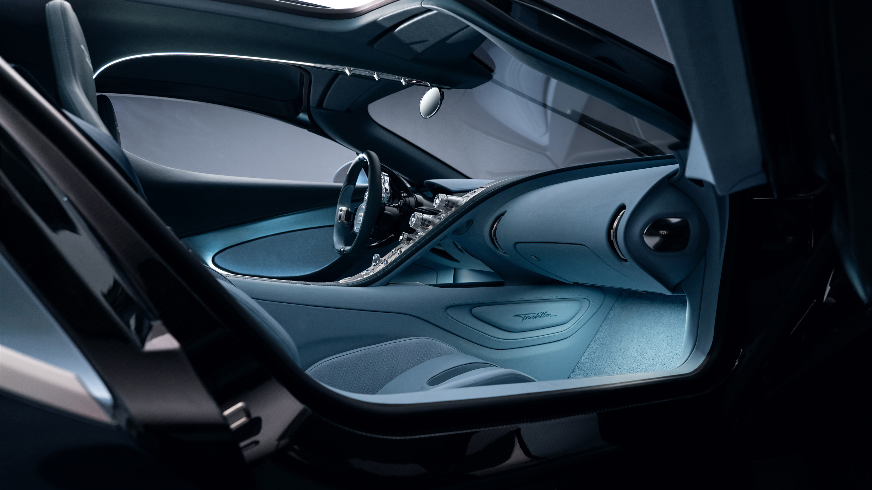 The seat and door surfaces surrounding the intricate control assembly.