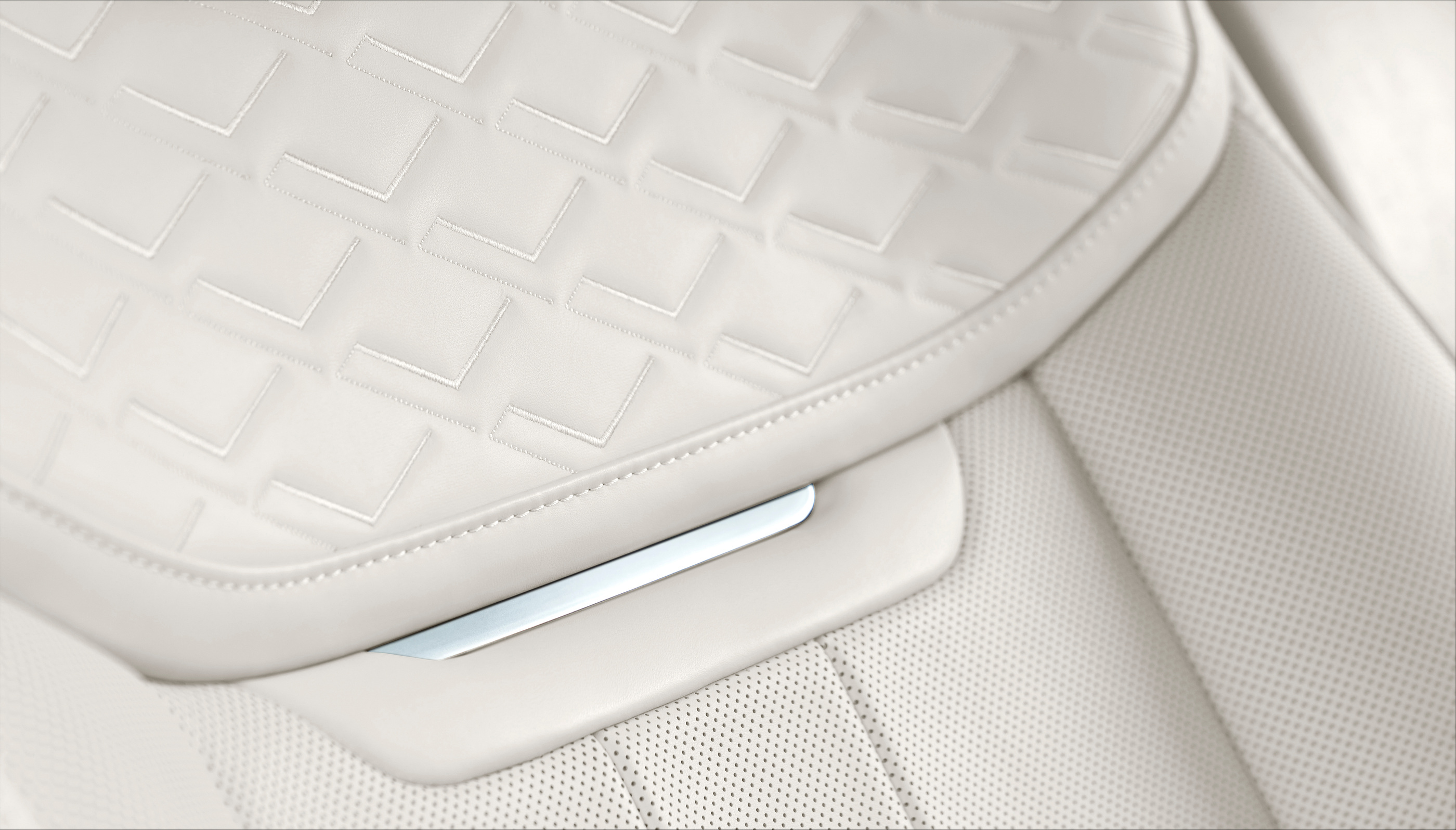 The pale upholstery and its surface detailing in the original Serenity presentation.