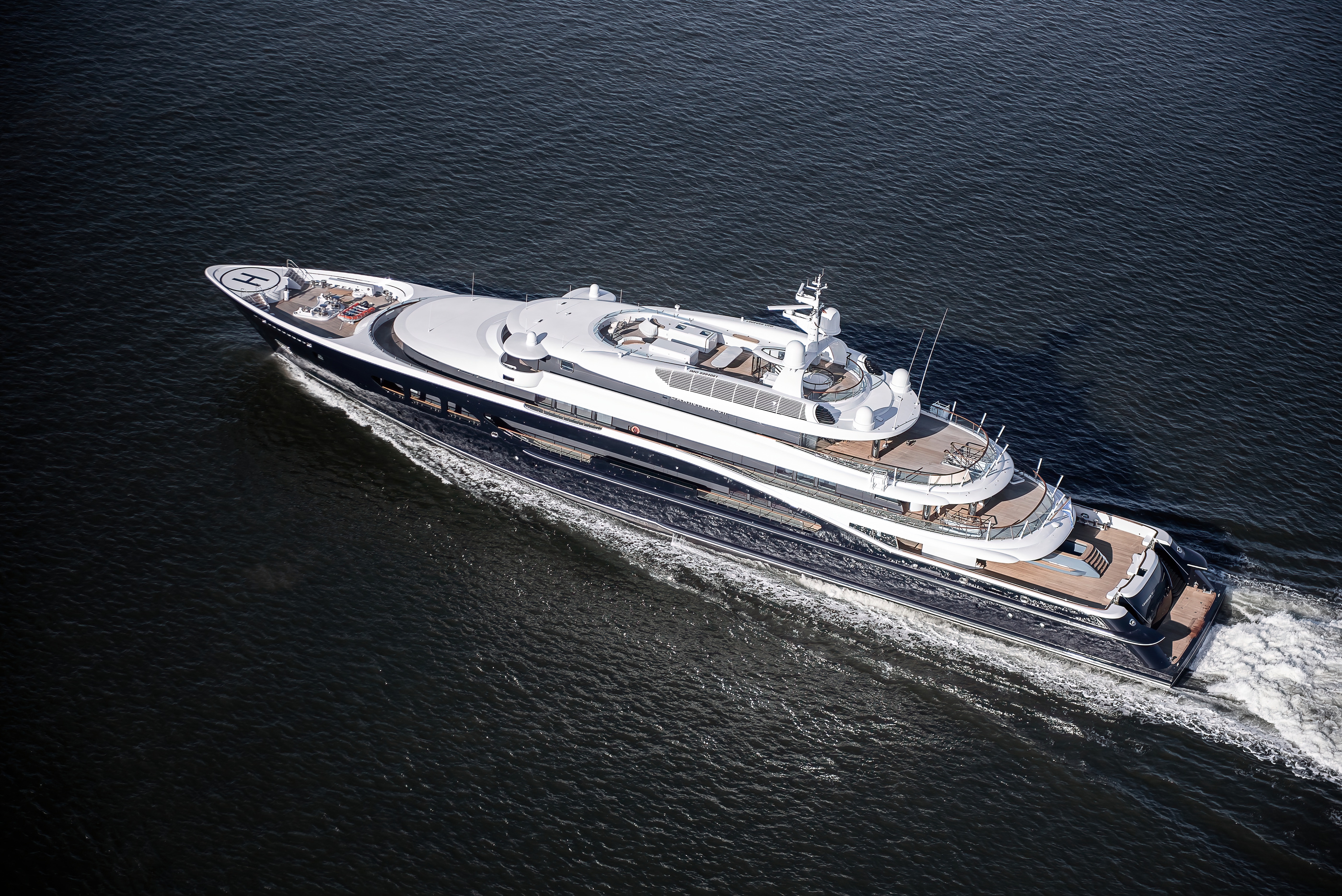 An elevated view of CARINTHIA VII reveals the sequence of open decks within the dark-hulled profile.