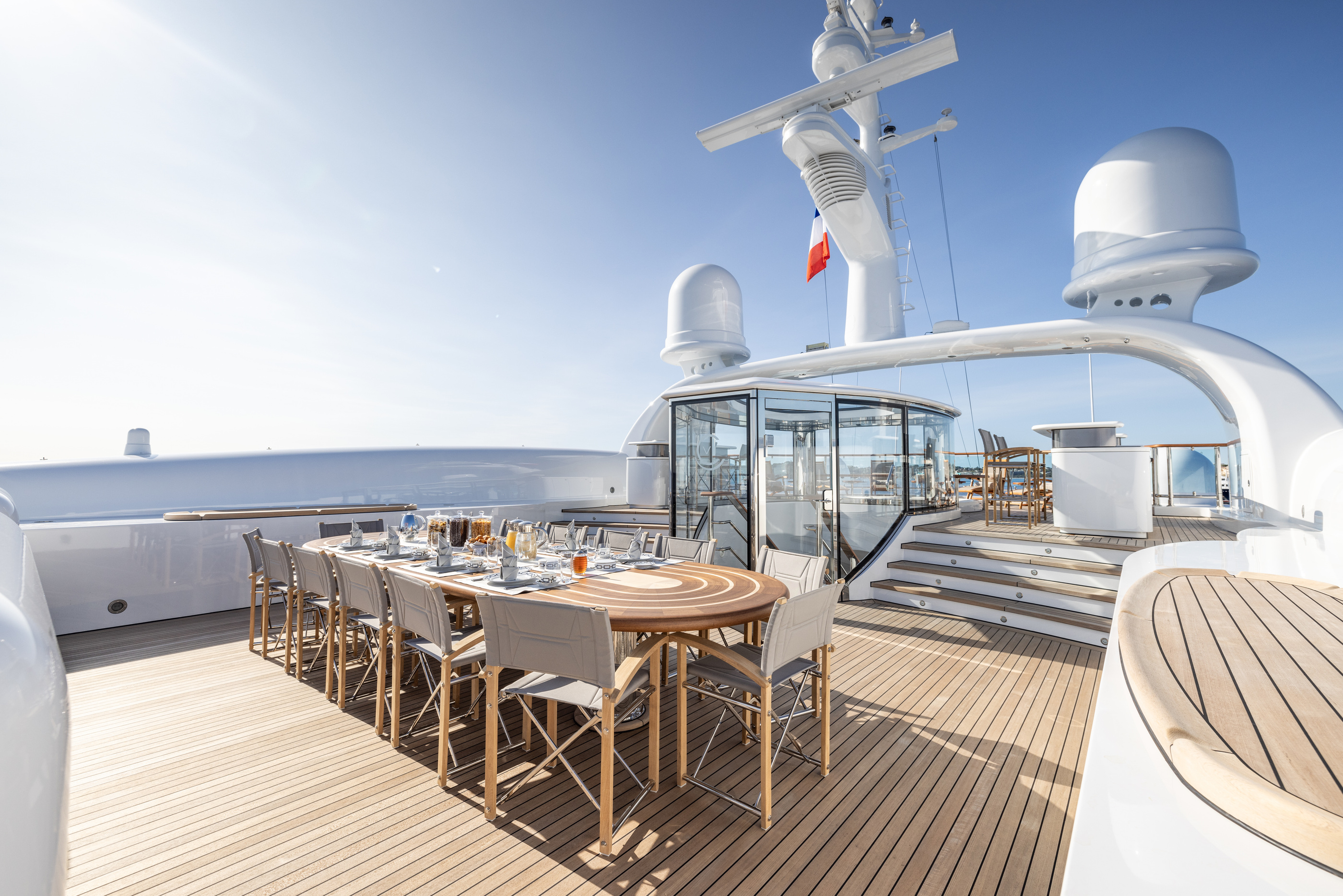 Outdoor dining within the curved upper-deck arrangement of CARINTHIA VII.