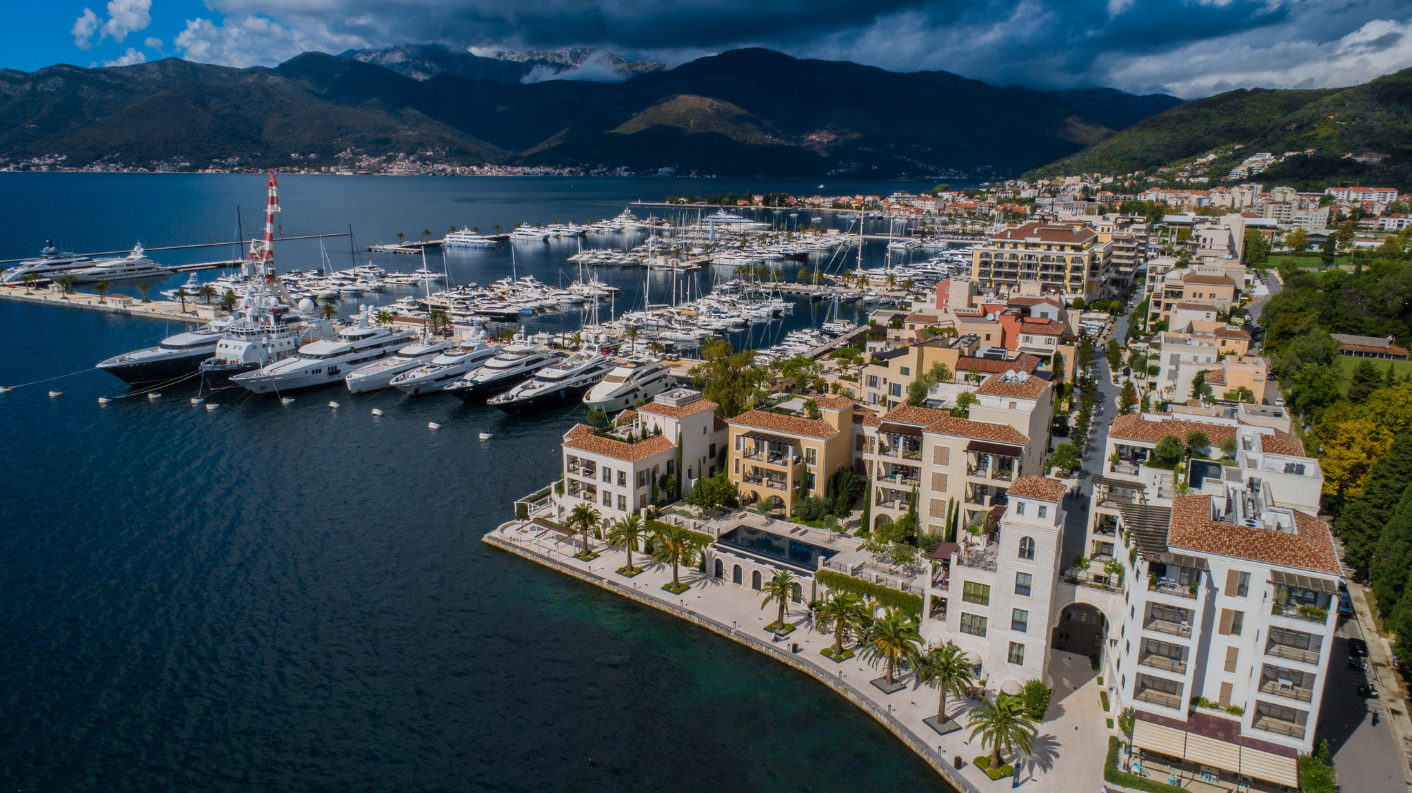 The marina and adjoining buildings seen together in Porto Montenegro’s official aerial photograph.