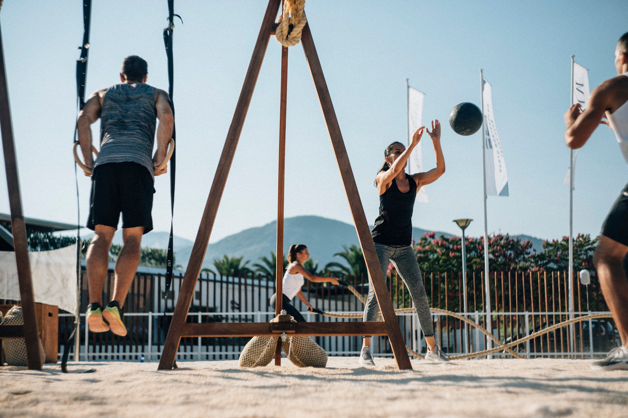 An official lifestyle photograph of outdoor exercise beside the marina; no visitor entitlement is implied.